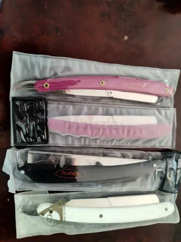 Set of 4 folding straight razors (preowned)