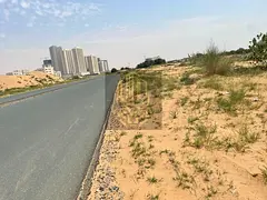 Residential &amp; commercial land for sale in Ajman – Al Alia, 18,307 sq.ft, G+15 permit, freehold
