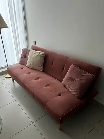 Velvet pink sofa bed in good condition