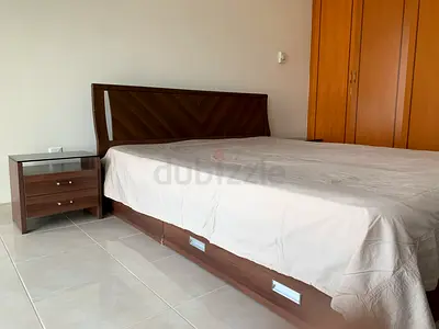 Kingsize bed, two bedside tables