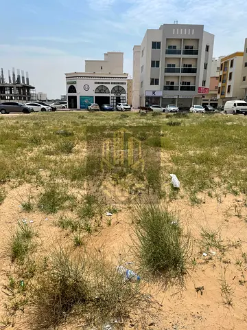 Residential commercial land for sale in a prime location in Al Aliya at an incredible price