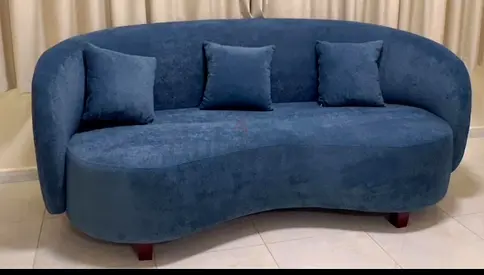 Stylish Blue Curved Sofa