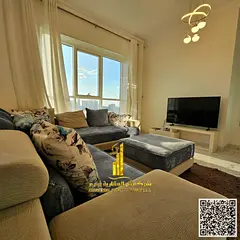 One-bedroom apartment with an open view, gym, swimming pool and parking for rent in Ajman - Al Rashi