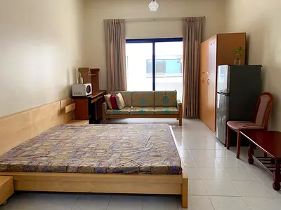 Spacious room with attached bathroom and balcony 5minutes walkable distance from Burjuman Metro stat