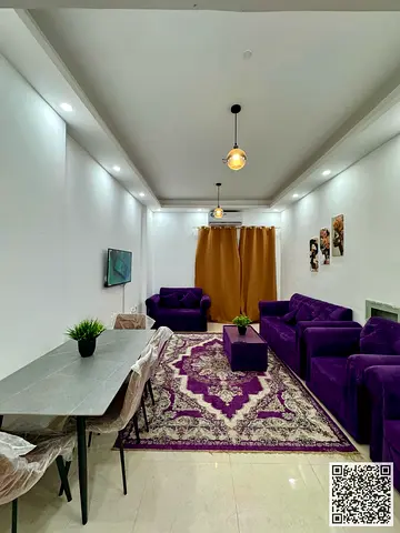 Furnished one-bedroom apartment for monthly rent in Ajman, Al Rashidiya 1 area - Sheikh Khalifa Street ✔️ Includes bills stylish and tidy furnishings
