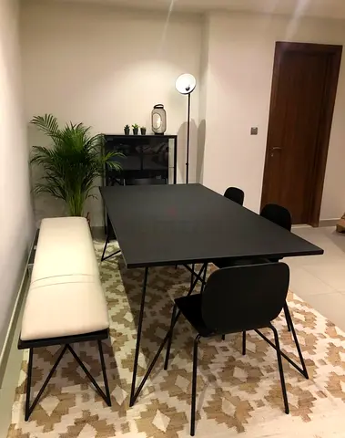 Modern black dining table with bench and 4 chairs — good condition