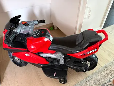 Red Ride-On Electric Motorcycle for Kids — Good Condition