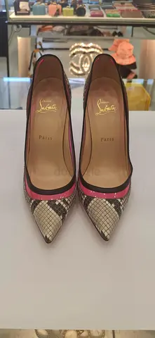 Christian Louboutin pointed-toe pumps, snakeskin print with pink trim, size EU 39