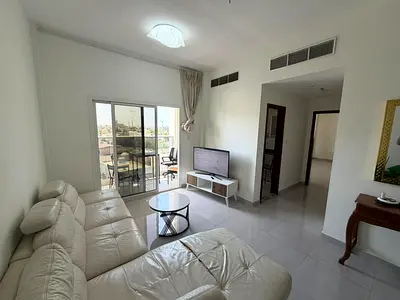 A master bedroom, two bathrooms, and a balcony with central air conditioning provide comfortable and upscale accommodation in a prime location close t