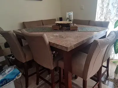 Marble-top High Dining Table with 8 Upholstered Bar Stools - Good Condition