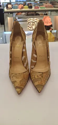 Christian Louboutin cork-pattern pointed-toe pumps, size available