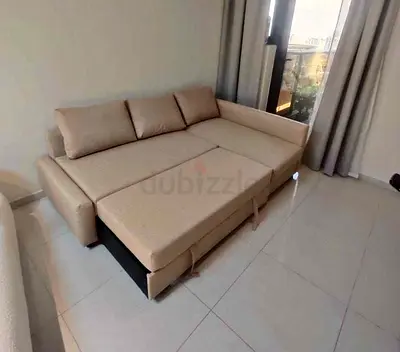 Ikea L Shape Sofa cum bed with big storage in L