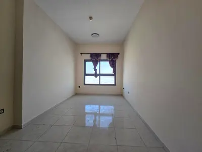 One bedroom and living room, Emirates City, central air conditioning, free maintenance, family accommodation, American kitchen