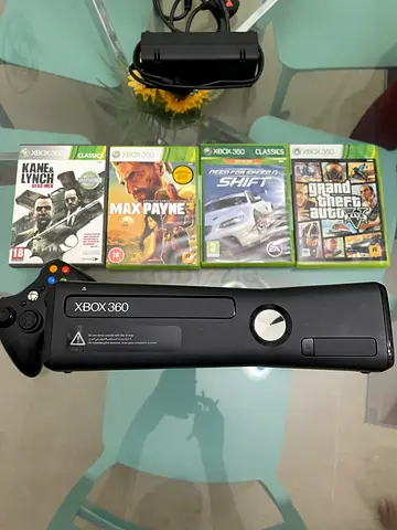 Xbox 360 for sale with original controller accessories and 4 games