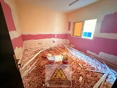 One-Bedroom Apartment for Annual Rent in Al Nuaimiya 1 Ajman – Central AC and Balcony