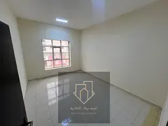 Spacious two-bedroom apartment with a living room in Al Muwaihat 2, with a balcony