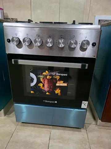 Used Bompani gas stove, usable less than one year, warranty remaining 1 month