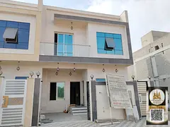 Townhouse with roof for sale, five bedrooms, living room, majlis, and kitchen, priced at AED 1,200,0