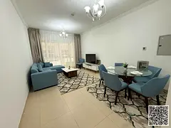 Luxury one-bedroom apartment with a balcony and open views. Ajman, Al Yasmin Towers. Fully furnished