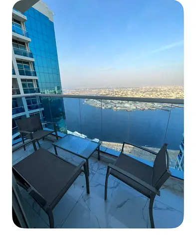 For annual rent in Ajman, a furnished two-bedroom apartment with a living room is available in Al Waha Tower, featuring a gym, swimming pool and park