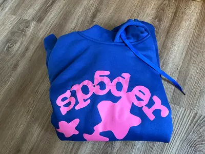 Blue hoodie with pink graphic print, size L — casual sweatshirt