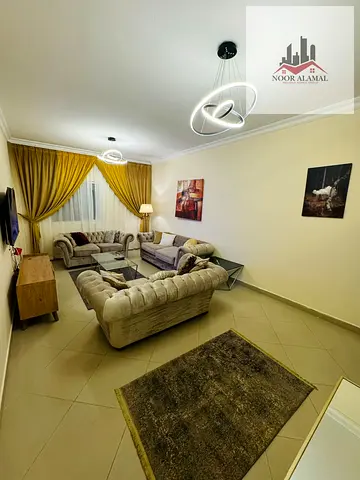 Sharjah, Al Taawun area: Three bedrooms, living room, kitchen, and three bathrooms. Furnished. Second tenant. Large area. Front view.