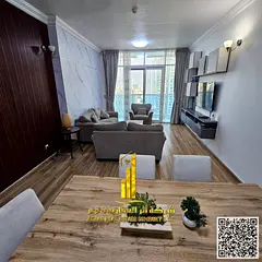 Luxury apartment with a sea view, two bedrooms, a living room, and a balcony. For monthly rent. Ajma
