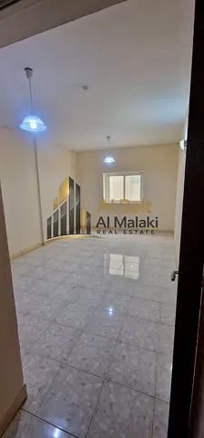 One bedroom and living room in Al Majaz 3, spacious area with balcony and two bathrooms