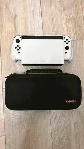 Nintendo Switch OLED White with Plants vs. Zombies: Battle for Neighborville (Game Included)