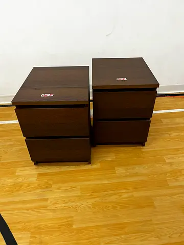 Pair of dark wood bedside tables / nightstands - good condition