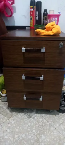 Wooden Nightstand with Three Drawers
