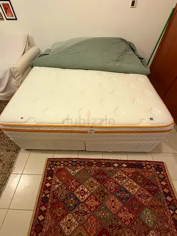 Large firm mattress with base in good condition. Free, quality memory topper