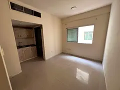 Very affordable price - separate kitchen studio apartment - prime location with easy access to Dubai