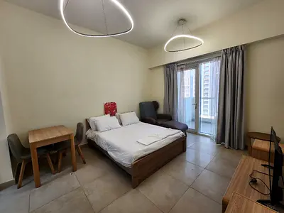 Modern Furnished Studio | Balcony | Parking | Prime Location