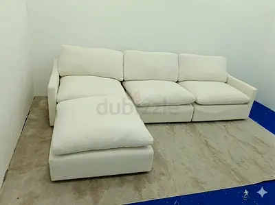 Four piece OC Home modular sofa with ottoman