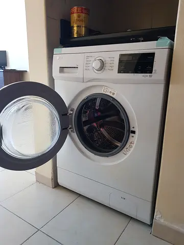 Almost New LG Brand Front-Load Washing Machine, 7kg, White Color with still 8+years MOTOR warranty