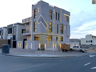 Corner villa, two floors and a roof, price including registration fees, freehold ownership in one of Ajman's most prestigious areas, available to all