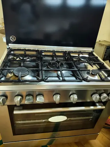 Used stainless steel 5-burner gas cooker with oven - good condition
