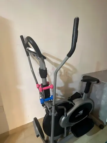 Used Home Elliptical Cross Trainer with Small Hand Weights