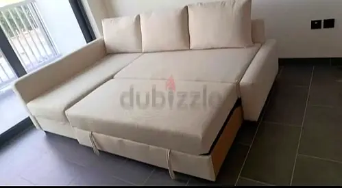 Beige L-shaped Sofa Bed with Storage — Convertible, Good Condition