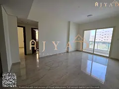 For rent: 2 bedrooms hall in Al Jurf 3 Ajman, first occupancy, 2 bathrooms, balcony, central AC, pre