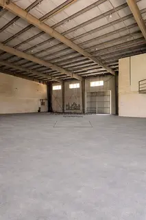 Code 3158 annual warehouse for rent in Umm Al Quwain located in a strategic position on a main road