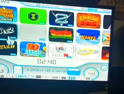 Nintendo Wii console with games (used) - menu shown with games