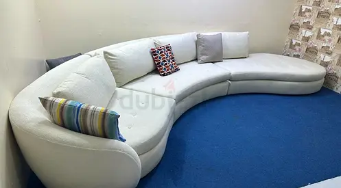 Comfortable crate and barrel beige color sectional sofa