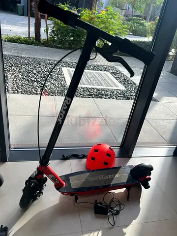 Razor Electric kids Scooter with Charger and Helmet - Good Condition