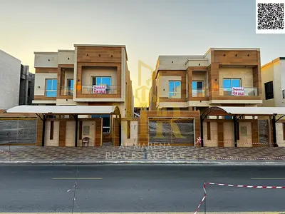 Turnkey villa, all fees included, on the main street, ready to move in, in the most prestigious area of ​​Ajman, freehold ownership for all nationalit