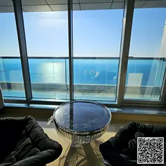 Luxurious three-bedroom duplex with a sea view, furnished, with a gym, swimming pool and parking for