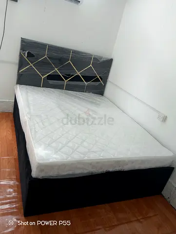 Queen size bed frame with mattress and upholstered headboard - good condition