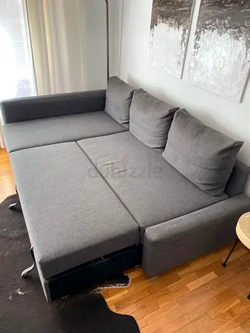 Grey L-shaped Sofa Bed with Storage — Good Condition