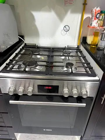 Used  Gas stove with Electric Oven Good Working Condition brand bosh German made